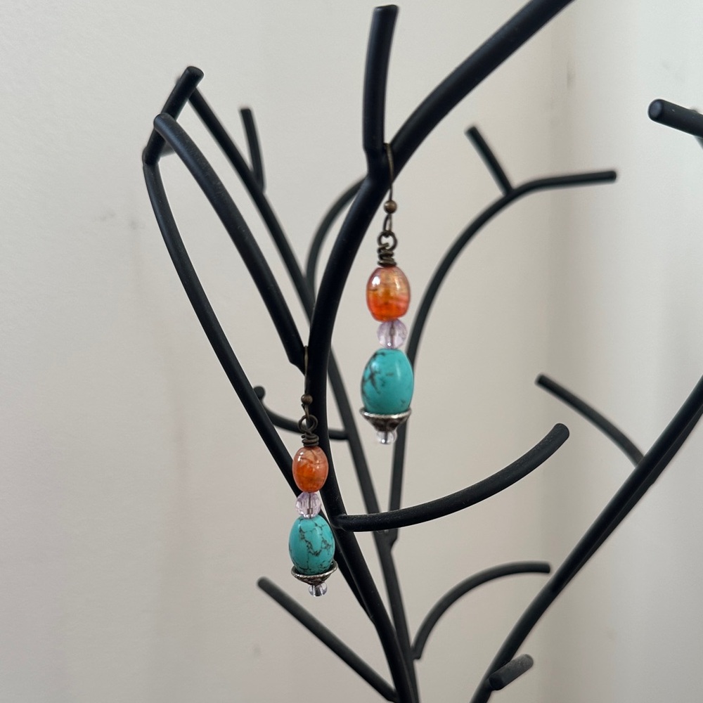 Artisan-made dangle earrings with turquoise and carnelian-like beads.